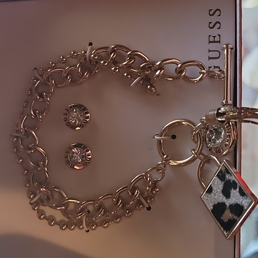 Guess earrings and bracelet gold
